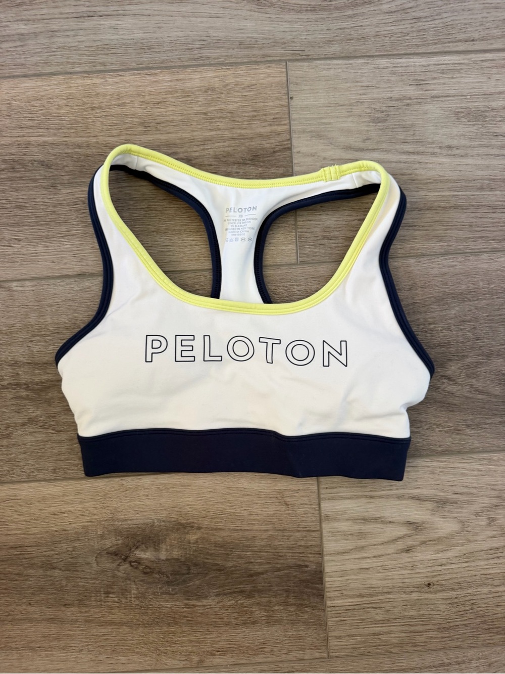 Peloton White Racerback Swim Top with Navy Band and Yellow Trim
